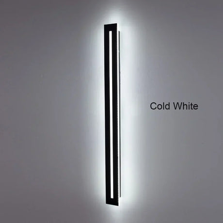 Chrome wall lamp shown above a table