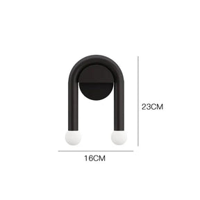 Entryway wall light with downward beam