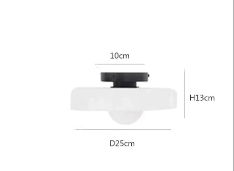 Wall lamp mounted in hallway setting