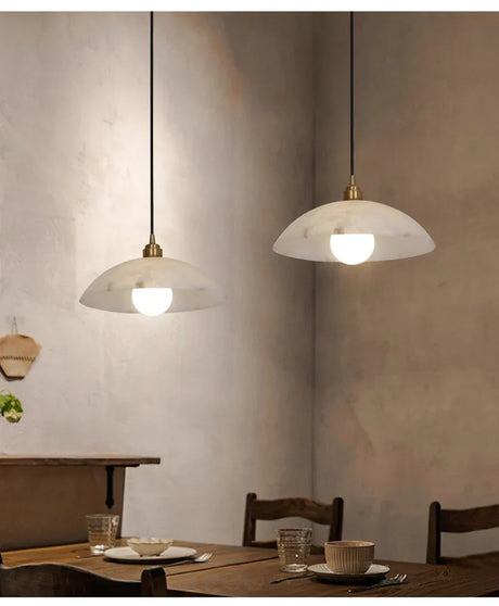 Pendant light glow in evening dining room