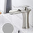 Brass waterfall bathroom faucet close-up view - single handle basin faucet