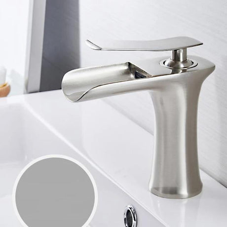 Brass waterfall bathroom faucet close-up view - single handle basin faucet