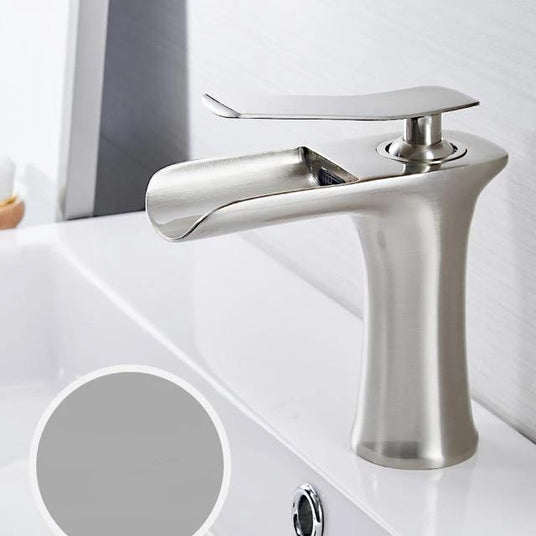 Brass waterfall bathroom faucet close-up view - single handle basin faucet