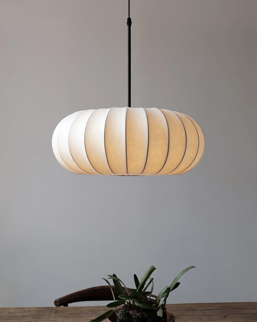 Pendant light for compact room spaces