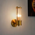Wall light for bathroom with gold finish sconce