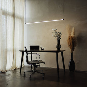 Glass pendant light with sleek modern silhouette design