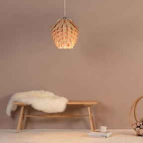 Wood pendant light with sculptural artichoke silhouette