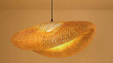 woven rattan pendant light for boho interiors