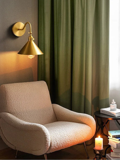 Wall sconce mounted above a reading chair