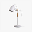 Adjustable desk lamp with a tilting white head on a wood stem, plain ground