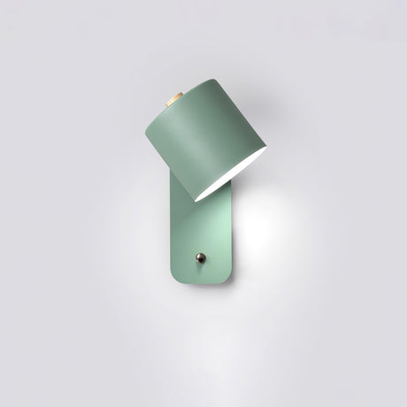 The green version seen at an angle, the cylinder tilted out from its plate