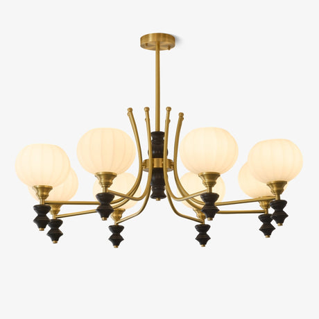 Aged brass chandelier with opal glass shades and black turned drops