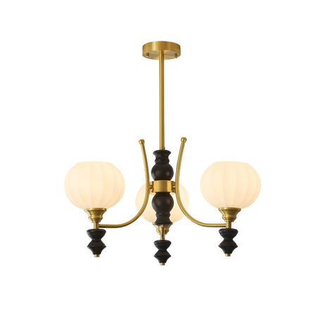 The three light build, brass arms and three rounded opal shades
