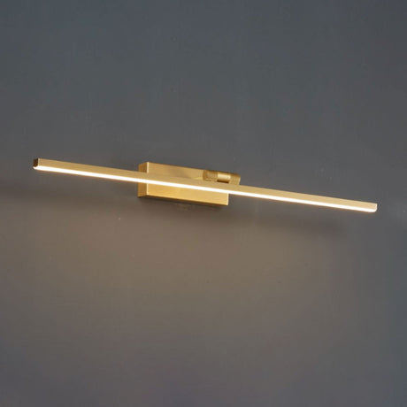 Close view of the offset bracket lifting the brass bar clear of a dark wall