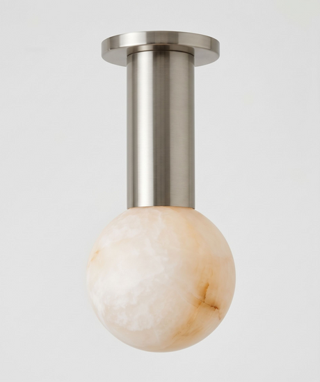 Nickel column alabaster sphere ceiling light shown close up against a plain background
