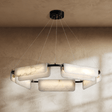 A ring of rounded alabaster bars on black arms below a round ceiling plate
