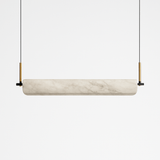 A single rounded alabaster bar held at each end by copper pins on cables