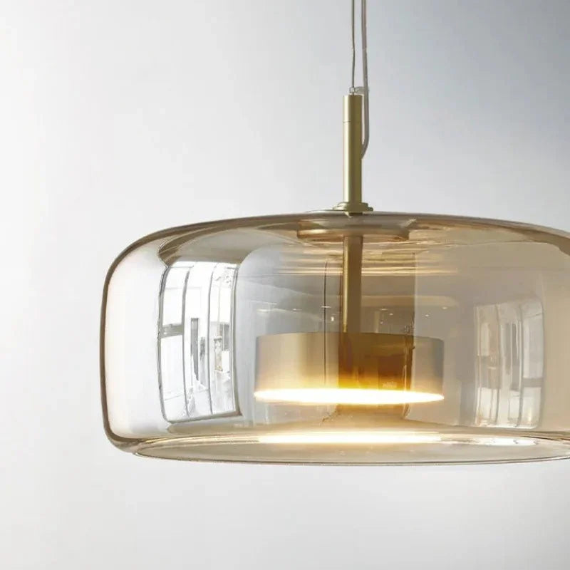 Close view of the amber bell shade with the lit diffuser inside