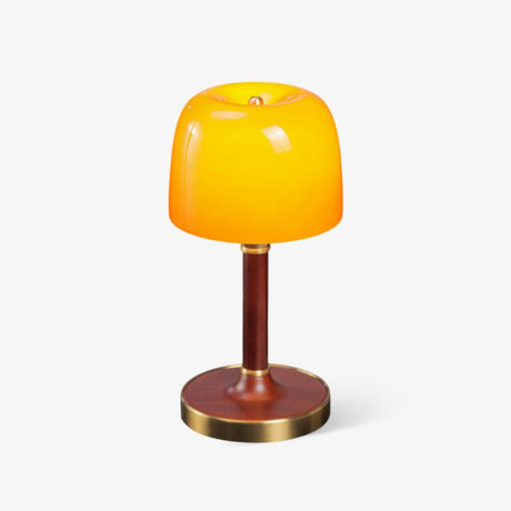 Amber table lamp with a small glass dome on a walnut stem, plain ground