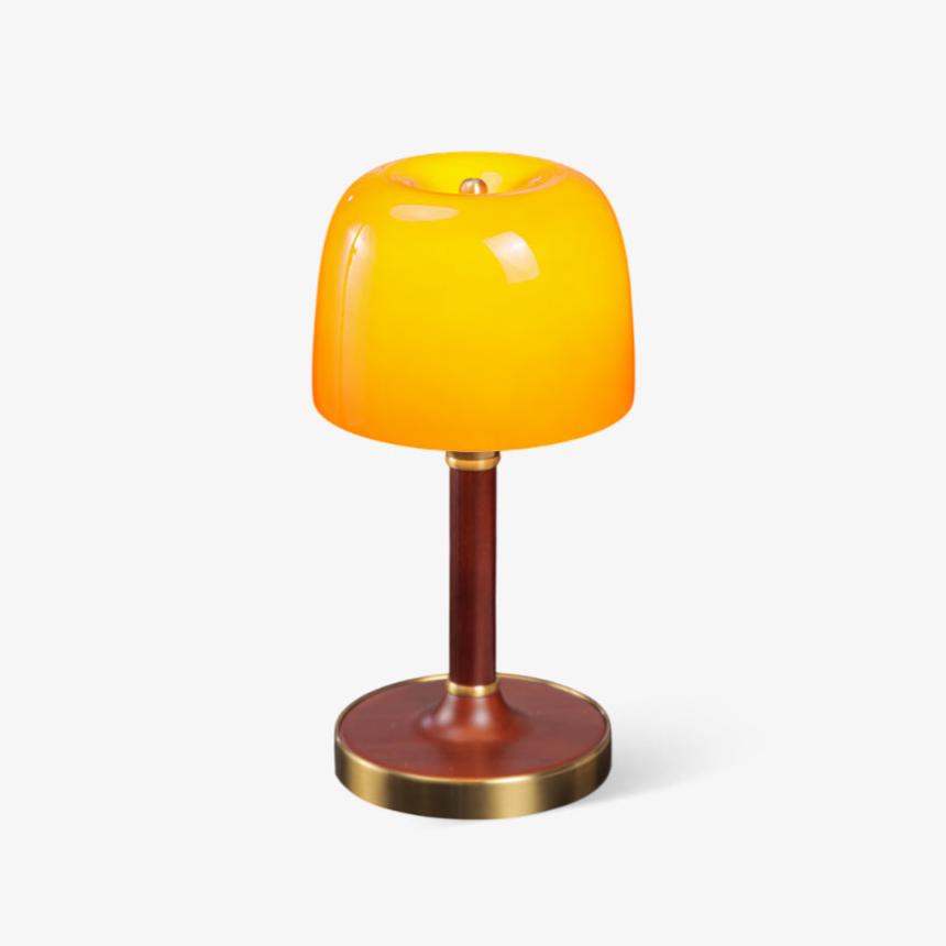 Amber table lamp with a small glass dome on a walnut stem, plain ground