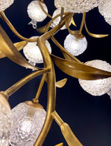 Close view of the brass branches where the stems meet
