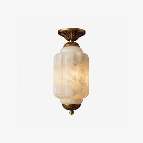 Antique brass flush mount ceiling light with a tiered scalloped alabaster shade