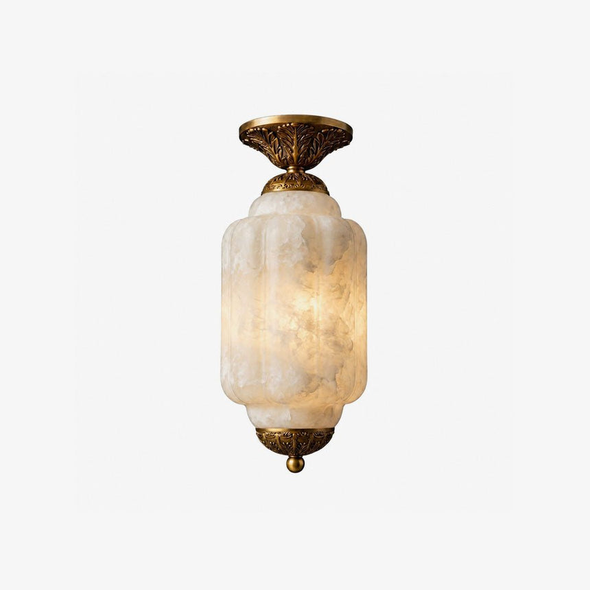 Antique brass flush mount ceiling light with a tiered scalloped alabaster shade
