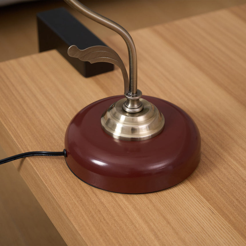 Angled close view of the wood base with the cord leaving the back