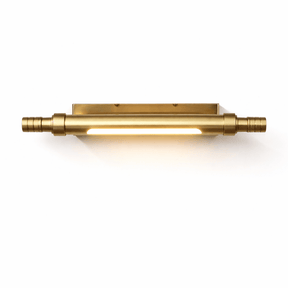 The brass tube seen level, both collars machined with fine ridges