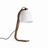 Bentwood arc lamp in walnut with a white shade on a plain ground