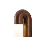 The walnut arch seen from the front with the diffuser unlit inside