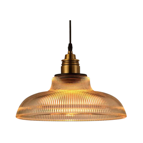 Amber prismatic glass shade with a brass top on a plain gray background