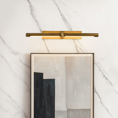 Brass twin bar lit above a framed artwork on a marble clad wall