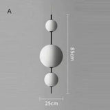 Version A drawn as three balls on an 85 cm rod with the 25 cm width marked