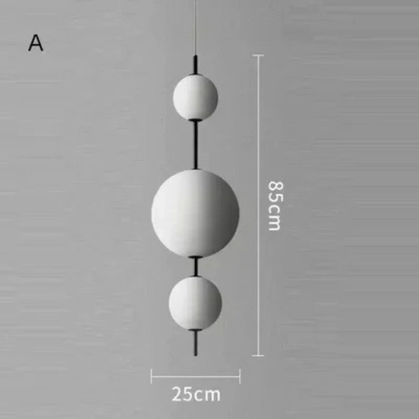 Version A drawn as three balls on an 85 cm rod with the 25 cm width marked