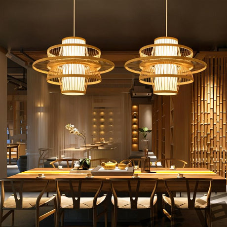 A row of tiered bamboo shades lit above wood dining tables and cane chairs