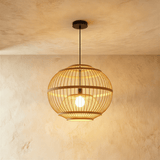 A rounded bamboo cage shade with the lamp visible through the vertical ribs