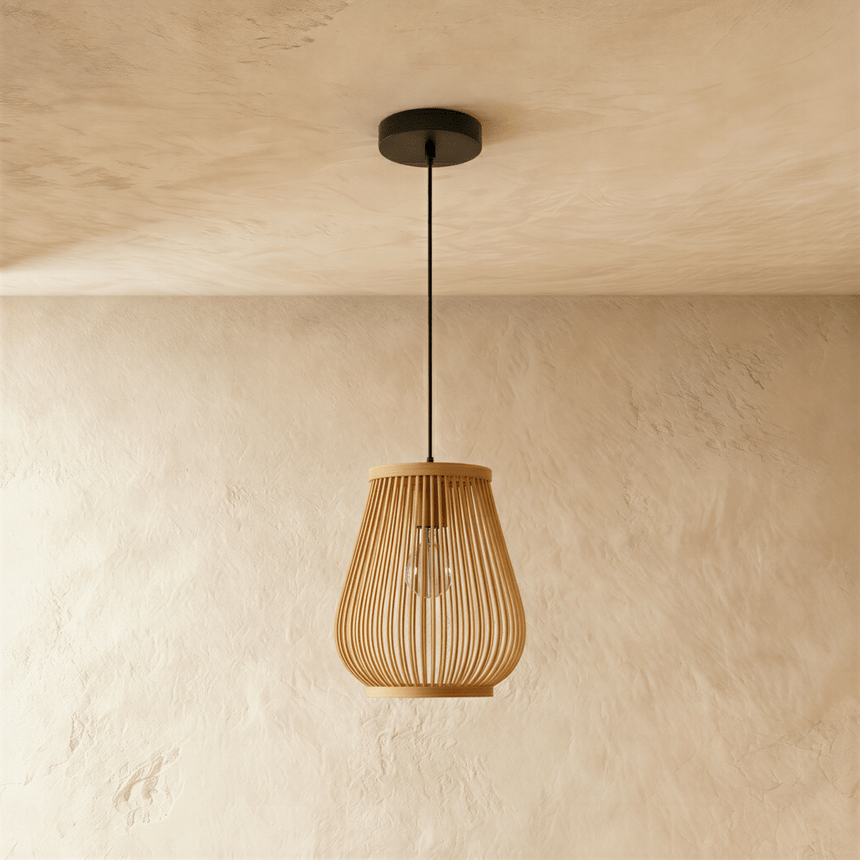 A tall narrow bamboo shade with the ribs drawn in toward the base