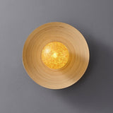 The bamboo disc lit, the crackled gold orb glowing at the middle of the rings