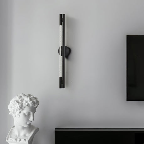 The bar on a gray wall above a low cabinet with a plaster bust