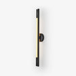 Slim black bar wall sconce with a lit strip running down its length