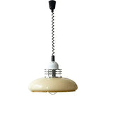 The cream saucer shade shown on its twisted cord against a pale background