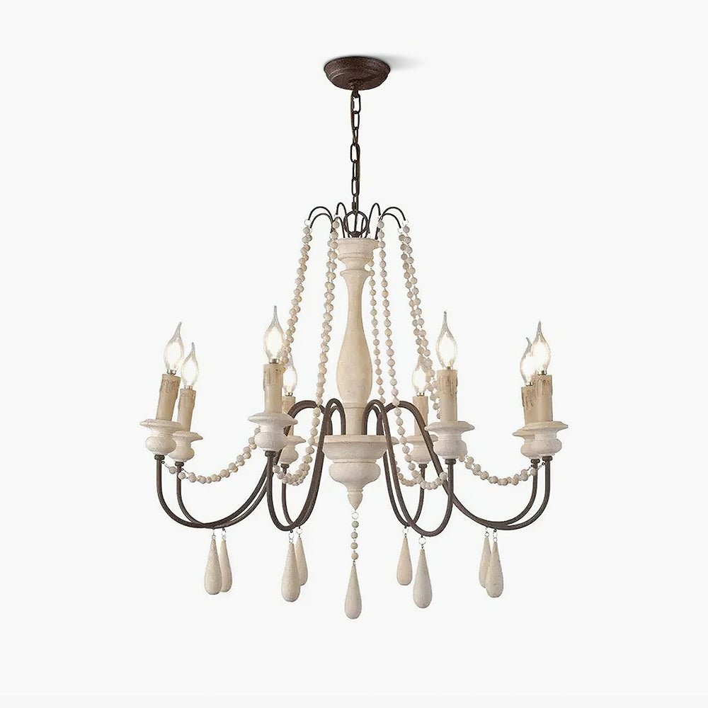 Wooden bead strands swagged across scrolling iron arms with candle lamps above