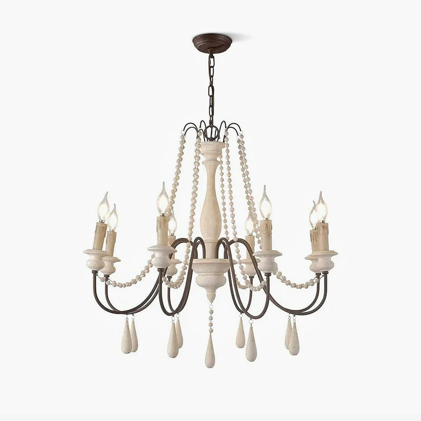 Wooden bead strands swagged across scrolling iron arms with candle lamps above