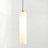 The white glass tube shown lit against a pale background