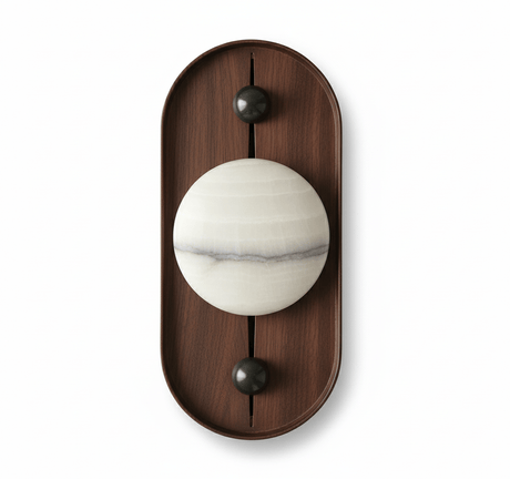Banded alabaster orb on a tall oval walnut plate against a plain wall