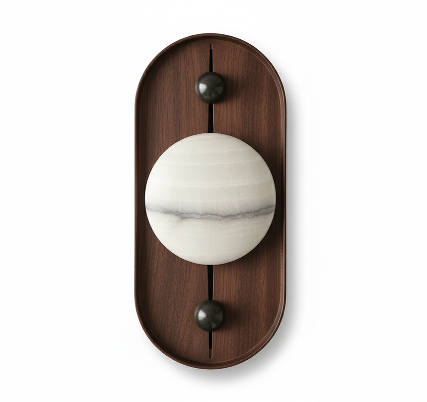 Banded alabaster orb on a tall oval walnut plate against a plain wall