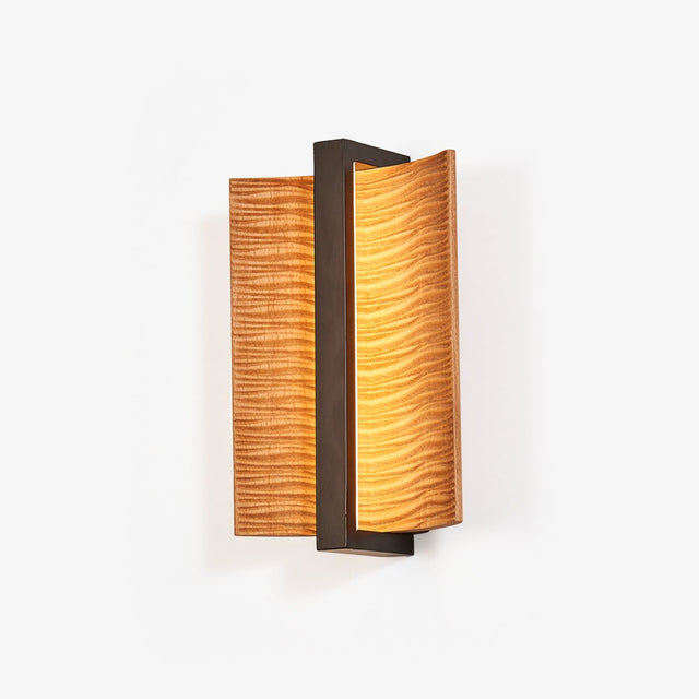 Bedside wall sconce, two curved wood wings with a lit slot down the middle