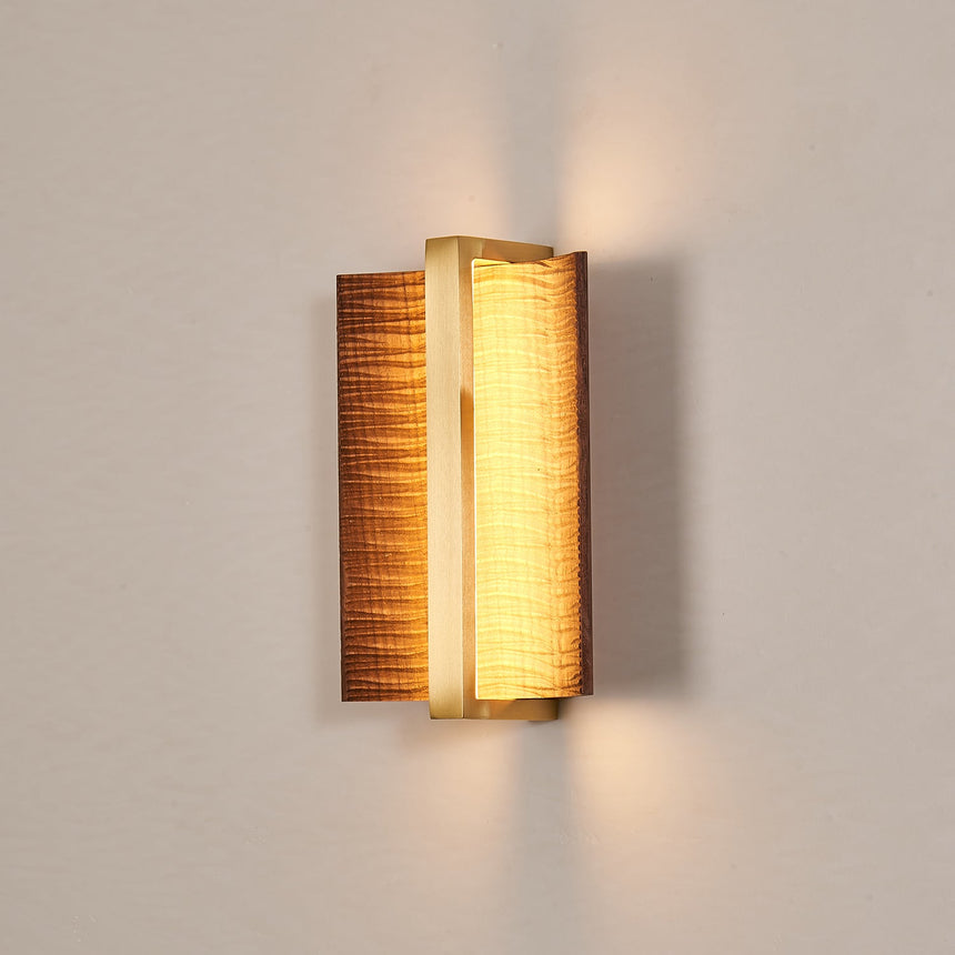 Close view of the lit slot where the two curved wings almost meet
