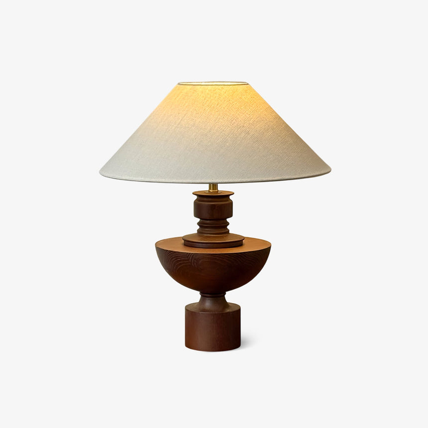 Beige table lamp with the walnut vase base seen from the front